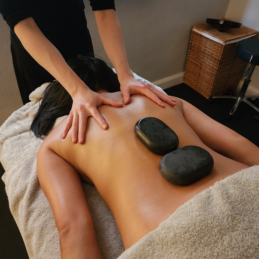 Hot stone massage spa treatment